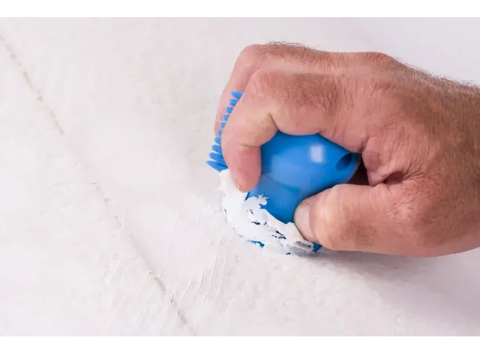 SURFLOGIC DINO WAX SCRAPER